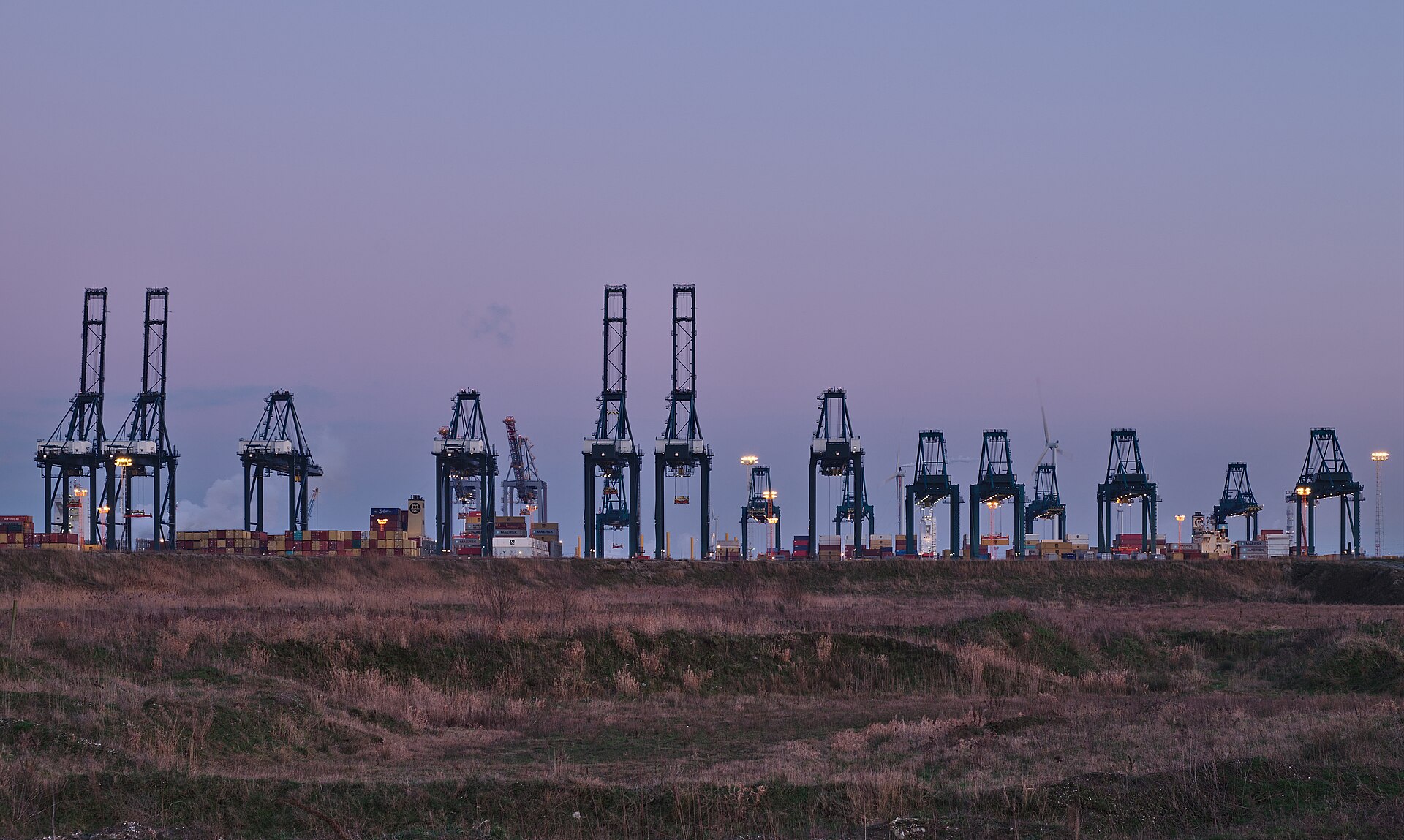 Port cranes at twilight